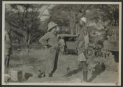 George Eastman talking to native man, African Safari