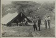 Assembling panoramic photo under tent, African Safari