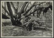 George Eastman reading beside Osa Johnson, African Safari