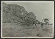 Osa Johnson and camels near mountain, African Safari