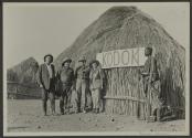 George Eastman and companions by Kodok sign, African Safari