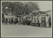 George Eastman and companions beside automobiles, African Safari