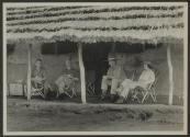 George Eastman and companions reclining in the shade, African Safari