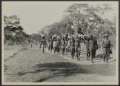 George Eastman being carried in sedan chair, African Safari