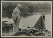 George Eastman examining dead crocodile, African Safari