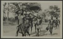 George Eastman being carried in sedan chair, African Safari