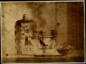 [Still life with bottle, glass and peach]