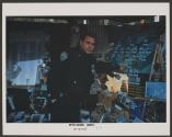 Officer Points to Dead Partner