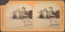 [Man seated outside Chillon Castle, Switzerland]