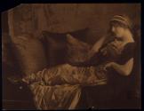 [Reclining woman on sofa]