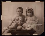 [Two children]