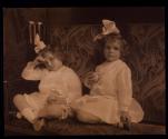 [Two children]