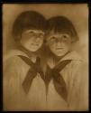 [Two children]