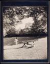 [Children on seesaw]
