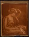 [Woman holding flower in front of mirror]