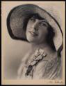 [Woman in hat]