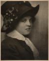 [Woman in hat]