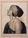 [Woman in headband]