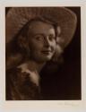 [Woman wearing hat]