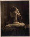 [Kneeling nude woman]