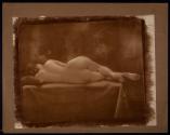 [Nude woman laying on side]
