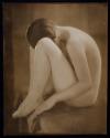 [Seated nude woman]