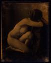[Kneeling nude woman]
