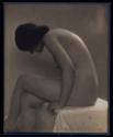 [Seated nude woman]