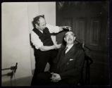 [Elias Goldensky posing a sitter]