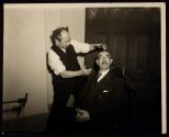 [Elias Goldensky posing a sitter]