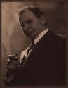 [Elias Goldensky with cigar]