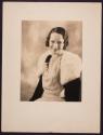 [Woman in evening wear]