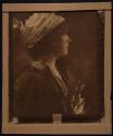 [Woman wearing hat]