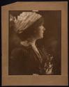 [Woman wearing hat]