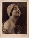 [Woman wearing hat]