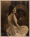 [Woman with feather fan]