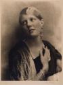 [Woman wearing jewelry]