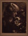 [Woman with flowers]