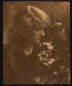 [Woman with flowers]