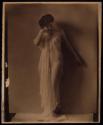[Woman draped in cloth]
