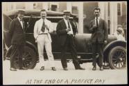 [Elias Goldensky and others in front of car]