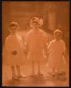 [Portrait of three children]