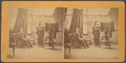 [Boy being photographed in studio]