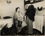 [Social worker visits mother with sick child, East Side, New York City]
