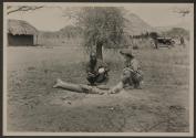 Osa Johnson and native man with ostrich egg, African Safari