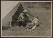 Dr. Audley Stewart attending to wounds, African Safari