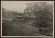 Osa Johnson outside village beside stream, African Safari