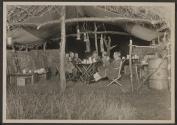 George Eastman and companions in dining hut, African Safari