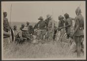 George Eastman and companions surrounding speared animal, African Safari