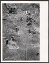 [Elevated view of workers in a construction site]